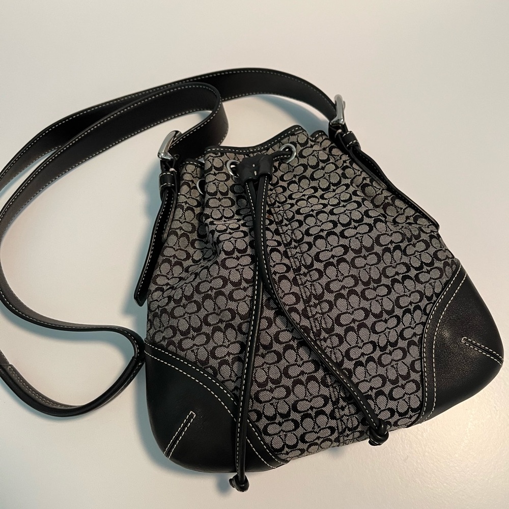 Coach, Minsig SOH Small Drawstring bag with Signature “C” pattern,
